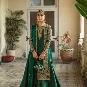 Embroidered  hand made Green Kurta with shrara on raw silk with organza duppta